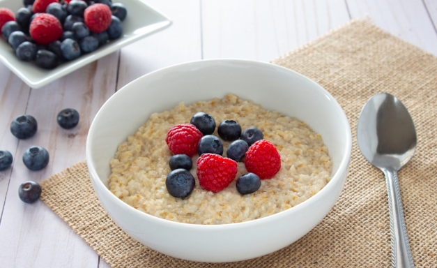 Breakfast pearl barley porridge with diluted milk